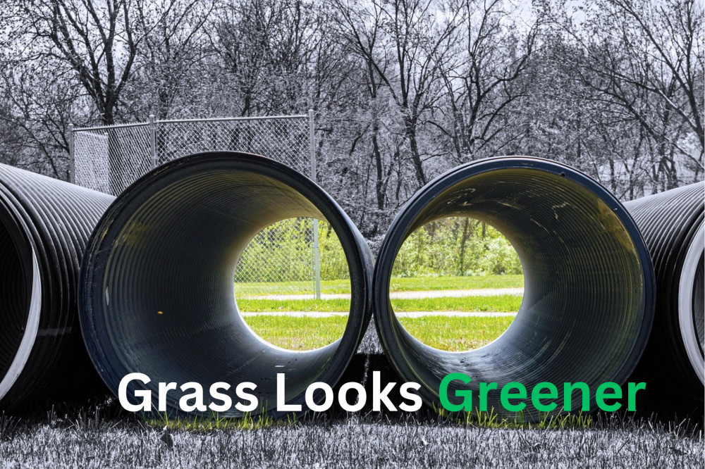 The Grass Greener Syndrome - A visual representation of large tubes resembling binoculars, symbolizing the desire to seek greener pastures."